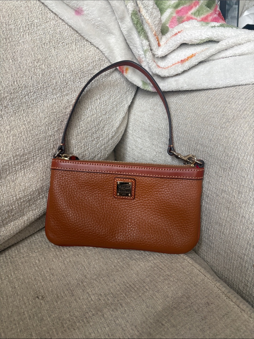 Dooney & Bourke Pebble Leather Wristlet in Cognac Brown